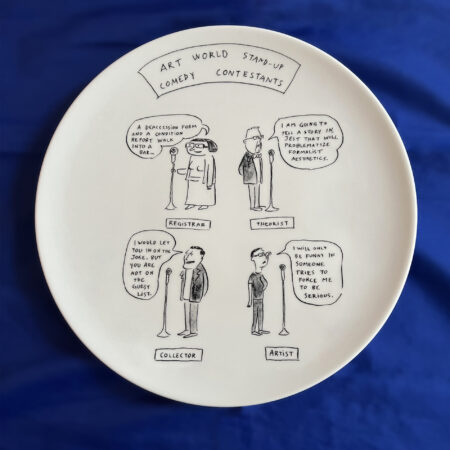 A photo of a white porcelain plate on a blue shiny fabric background. There is a cartoon drawn on the plate featuring 4 stand up comedians. The title stretches across the top saying "Art World Stand-up Comedy Contestants".
